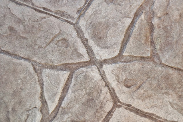 Small flagstone brick pattern on a stamped concrete patio.